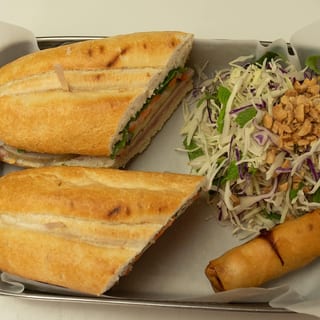 Box Lunch Sandwich- choice of Grilled ChiclledPork, Traditional, BBQ Pork, Tofu, Vegetarian Mock Beef, or Pulled Chickenken, Gri